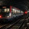 Поезд в темном туннеле метро