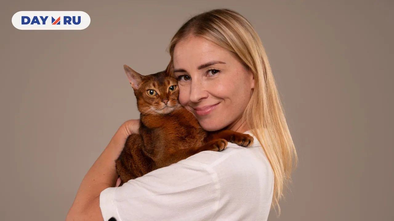 Женщина с кошкой