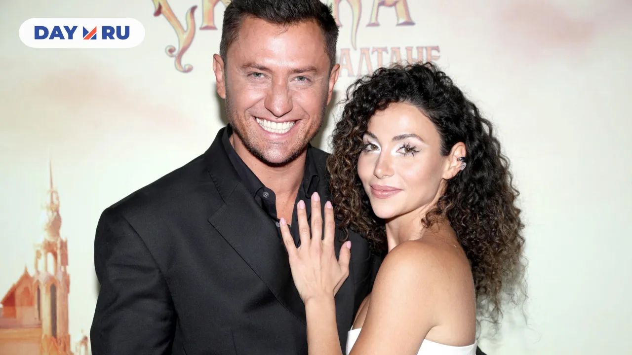 Павел Прилучный с супругой