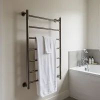 Грею пижаму и сушу обувь: вот как я использую полотенцесушитель каждый день и облегчаю себе рутину