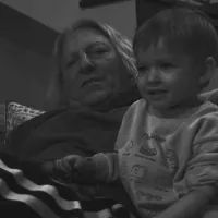 Александр Олейников с внуком