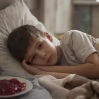 Ребенок в кровати